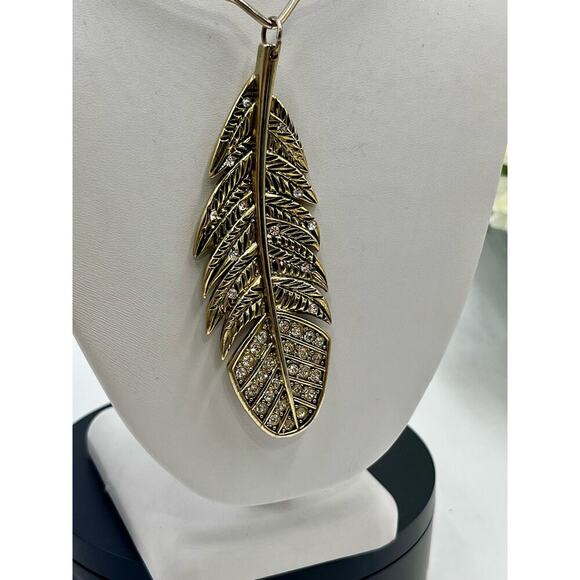 Betsey Johnson Indian Summer Lg
Pave Feather Choker Torque Gold Tone Necklace - Picture 7 of 15